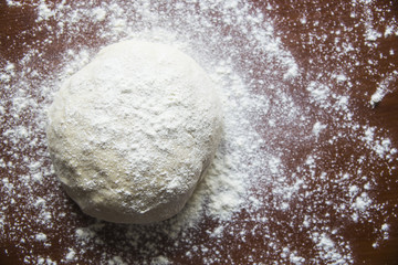Preparation for baking bread - kneading dough in your home kitchen