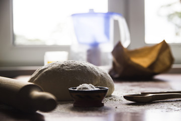 Preparation for baking bread - kneading dough in your home kitchen