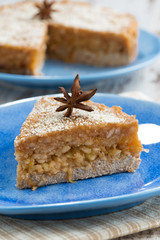 piece of cake with apple jelly on a plate, vertical