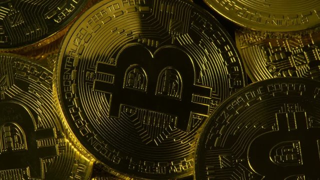 Bitcoins Close Up Rotating View Seamless Loop
