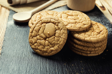 Biscuit sweet cookie background. Domestic stacked butter biscuit pattern concept,close up macro.Homemade cookies on wooden table.Cereal biscuits with the sesame,peanuts,sunflower and amaranth.