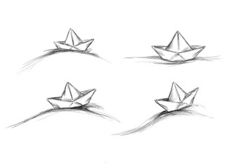 Vier verschiedene Papierschiffchen