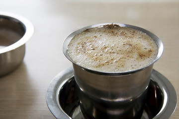 Filter coffee served in a tumbler 