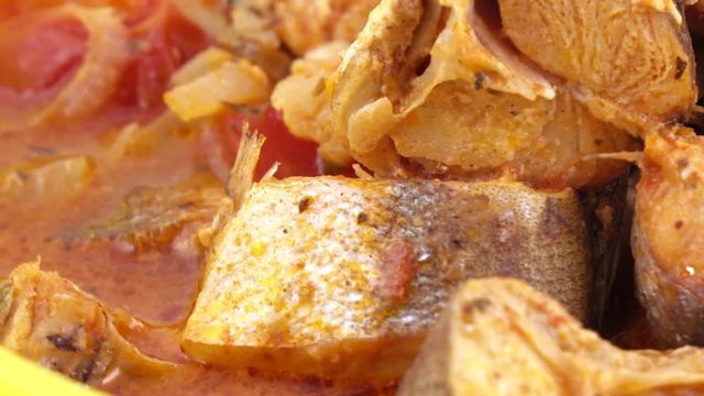 Fried pollock with onions