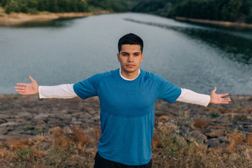 Athlete inhaling fresh mountain air