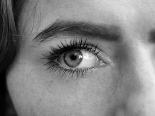 Naklejka premium Close of up red haired womans face black and white