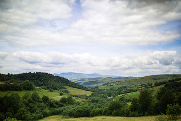 Naklejka premium Beautiful rural landscape in the mountains. Carpathian Mountains, Ukraine. Concept ecology protection. Explore the world's beauty.