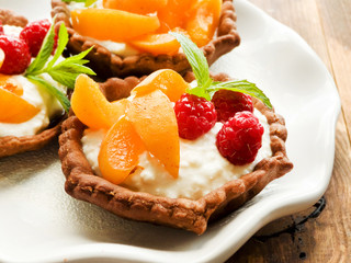 Tartlets with cheese and berries