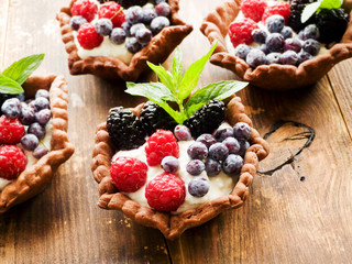 Tartlets with cheese and berries