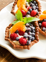 Tartlets with cheese and berries