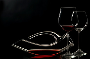 Isolated wineglasses and decanter for romantic dating