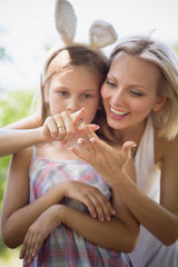 Women afraid of insects, mo teaching girl no to be afraid of insects. Mommy Showing her daughter little insect.
