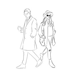 Fototapeta na wymiar Iconic trendy couple wearing hat and long coat for Fall style