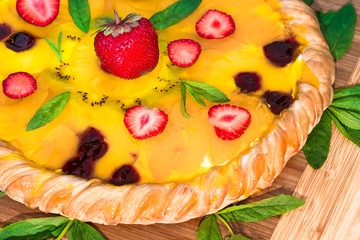 Fruit pizza with strawberries kiwi pineapple