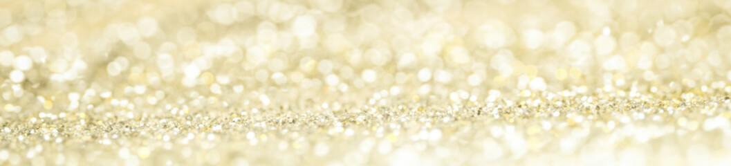defocus of glitter vintage lights background and panorama. gold and silver for Christmas and new year background.