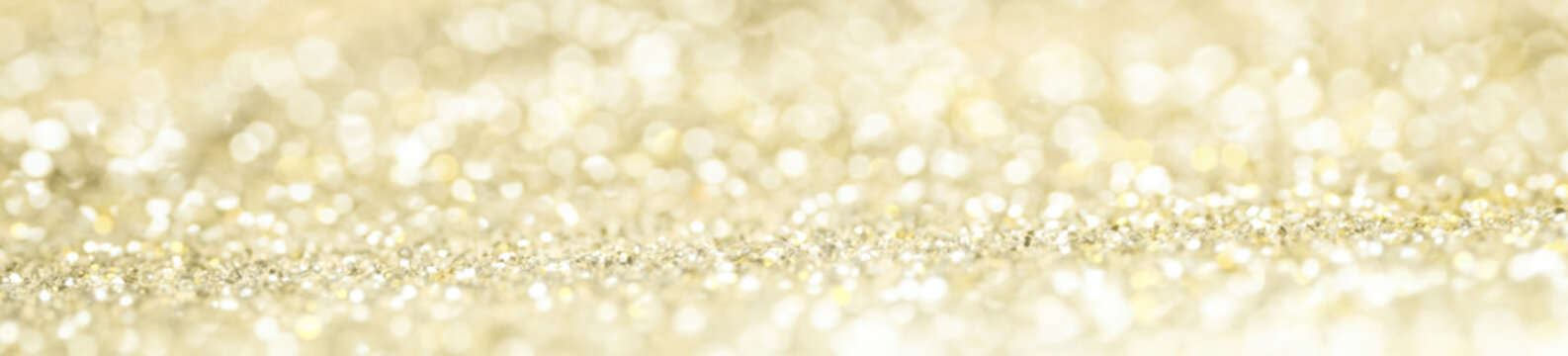 defocus of glitter vintage lights background and panorama. gold and silver for Christmas and new year background.