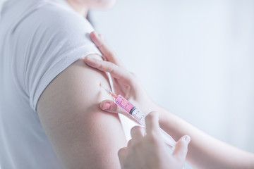 Injections on the upper arm.