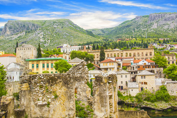 Fototapeta na wymiar A beautiful view of the Neretva River in Mostar, Bosnia and Herzegovina, on a sunny summer day