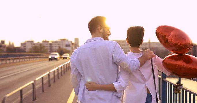 Romantic couple in love dating in sunset outdoor