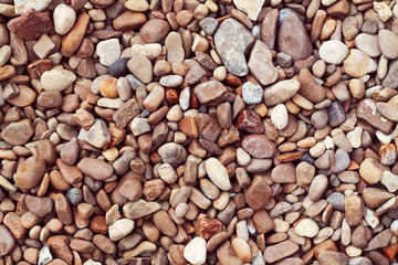 Sea pebbles. Small stones gravel texture background.Pile of pebbles, thailand.Color stone in background.
