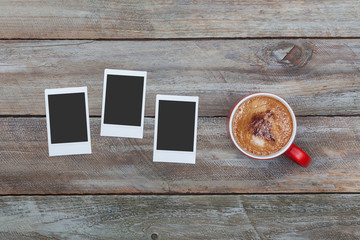 Red coffee mug and instant photos