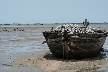 An abandon shipwreck during the period of low tide