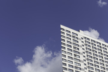A part of modern business building against blue sky