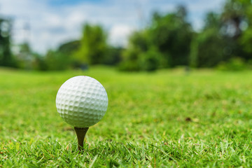Golf ball on tee ready to be shot