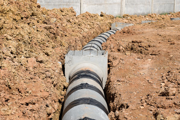 Concrete drainage pipe and manhole.