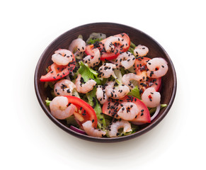 Bowl of original asian salad with shrimps and vegetables isolated at white