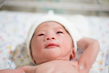 Newborn baby boy at obstetric room in hospital, First days of life