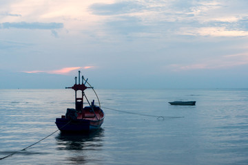 Morning light with fishing boat