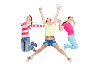 Fototapeta na wymiar Happy kids jumping at studio, copy space