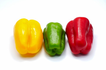 Red green yellow color bell pepper isolated on white background