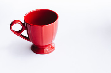 On white background beautiful red mug