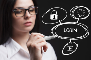 The concept of business, technology, the Internet and the network. A young entrepreneur working on a virtual screen of the future and sees the inscription: Login