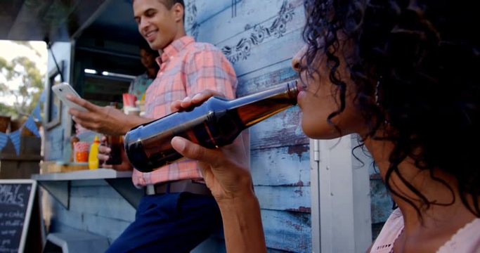 Group of friends drinking beer bottles