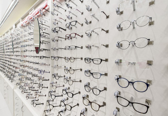 Optician's shop shelves with eyeglasses rims