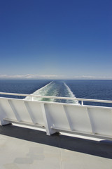 Eastern view of the Strait of Georgia from a ferry boat deck, British Columbia, Canada on a bright sunny day in May.