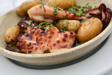 Grilled octopus with batatas a murro. Portugal