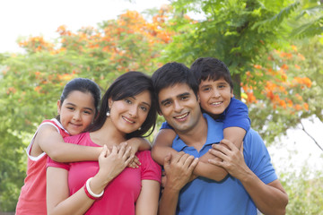 Portrait of family in park