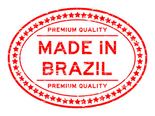 Grunge red premium quality made in Brazil oval rubber seal stamp on white background