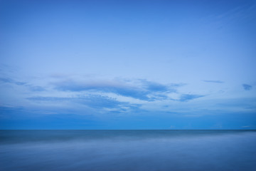 Plakat abstract clear sky and smooth sea on blue filter