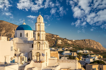 Pyrgos, Santorini island, Greece. Cycladic traditional village with blue domes of churches and...
