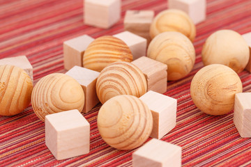 Wooden balls and cubes