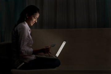 Young woman doing online shopping 