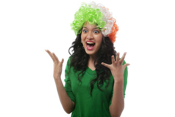 Girl with a wig cheering 