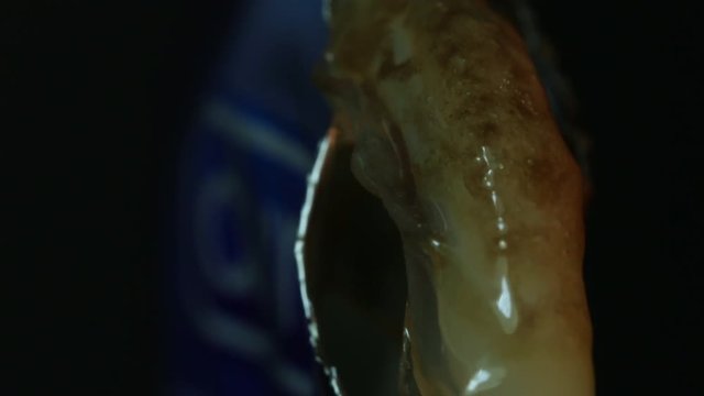 Condom wrapper melts, macro close up