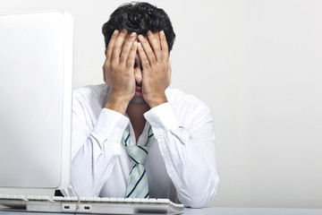 Businessman stressed at work 