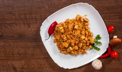 Rice with Vegetables and Meat in a plate. with copy space. top view